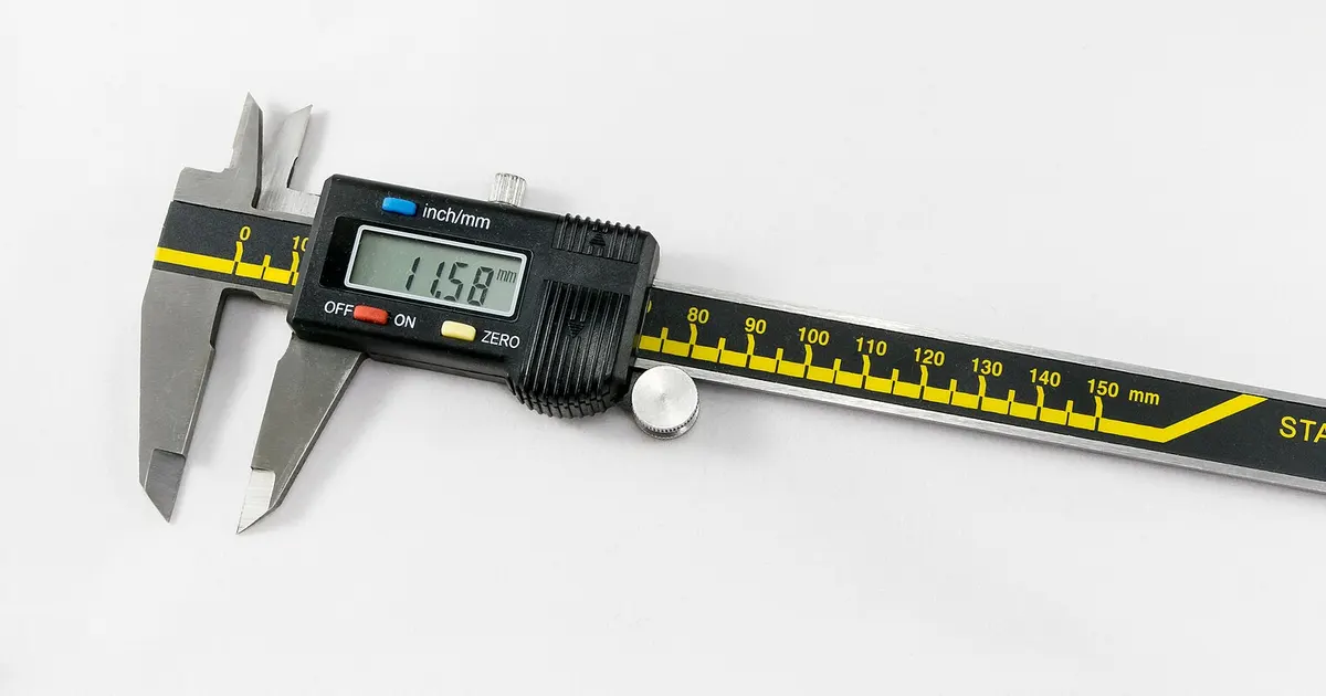 Digital caliper on a white background, a tool used to measure dimensions during a bagasse tableware inspection